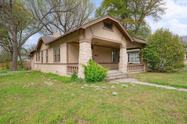 view of front of house with a front lawn