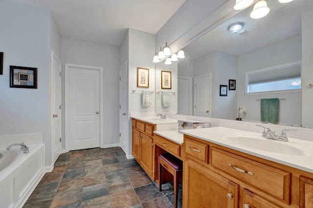 bathroom with vanity and a tub to relax in