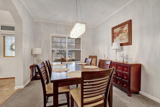 carpeted dining space featuring crown molding and plenty of natural light