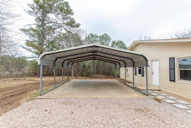 view of parking / parking lot featuring a carport