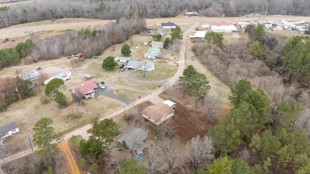 birds eye view of property with a rural view