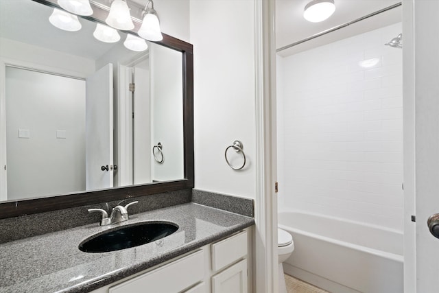 full bathroom featuring vanity, bathtub / shower combination, and toilet