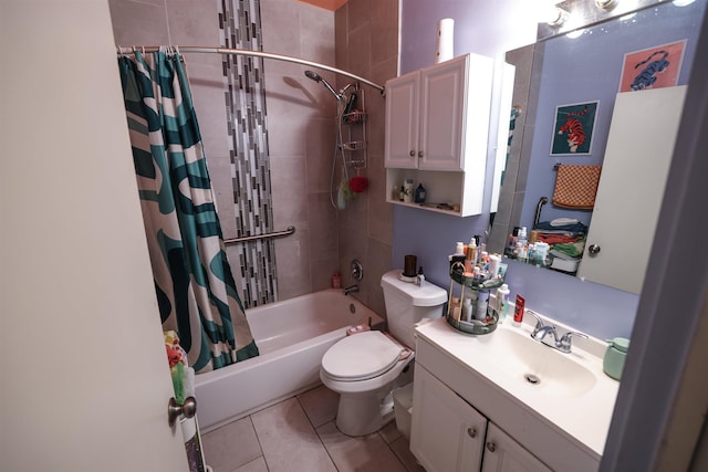 full bathroom featuring tile patterned floors, toilet, vanity, and shower / bath combo