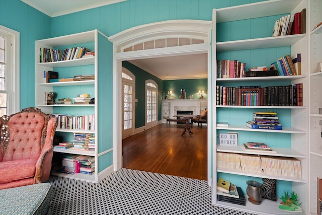 sitting room featuring ornamental molding