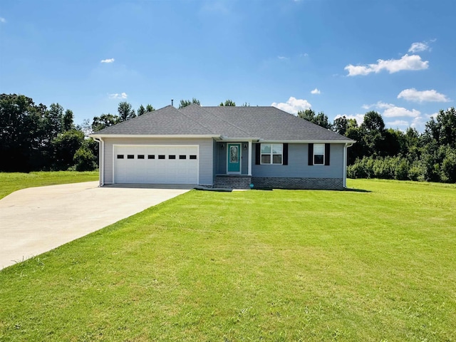 view of front facade with a garage and a front yard