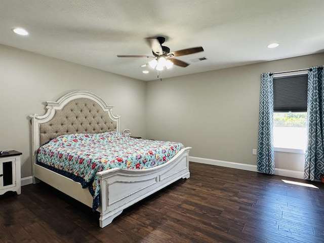 bedroom featuring dark wood-type flooring and ceiling fan