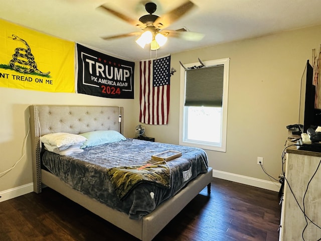 bedroom featuring dark wood-type flooring and ceiling fan