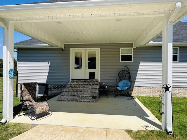 doorway to property with a patio