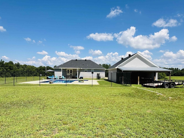 view of yard with a fenced in pool