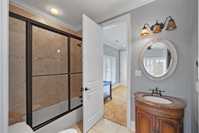 full bathroom with crown molding, shower / bath combination with glass door, vanity, tile patterned floors, and toilet