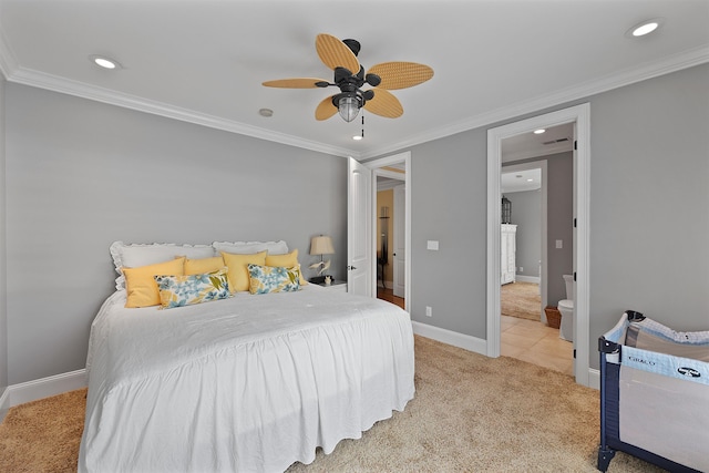 carpeted bedroom featuring ceiling fan and ornamental molding