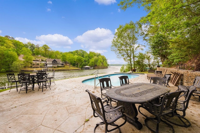 view of patio / terrace with a water view