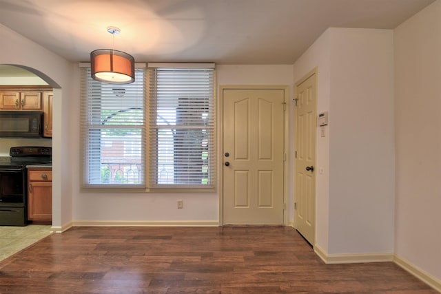 interior space featuring dark hardwood / wood-style flooring