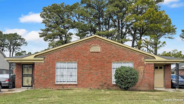 view of side of home featuring a yard