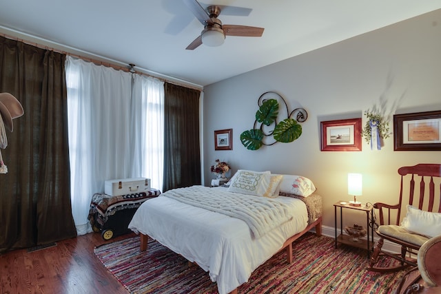 bedroom featuring hardwood / wood-style flooring and ceiling fan