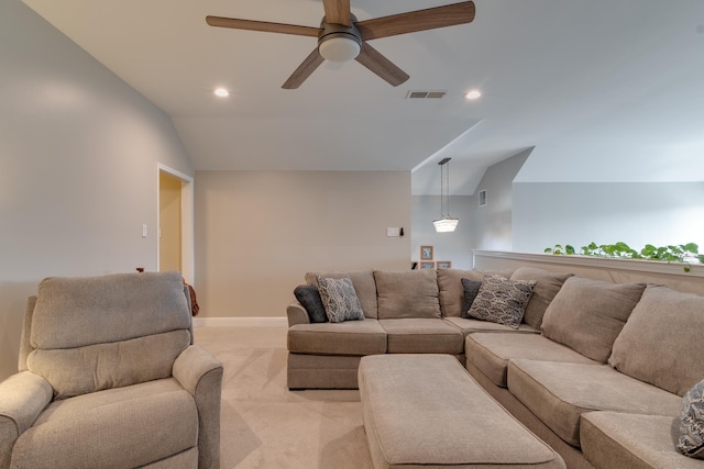 carpeted living room featuring lofted ceiling and ceiling fan