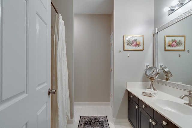 bathroom featuring vanity and tile patterned flooring