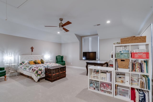 bedroom featuring vaulted ceiling, light carpet, and ceiling fan