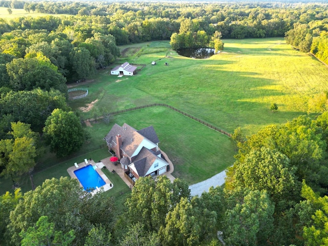 birds eye view of property with a rural view