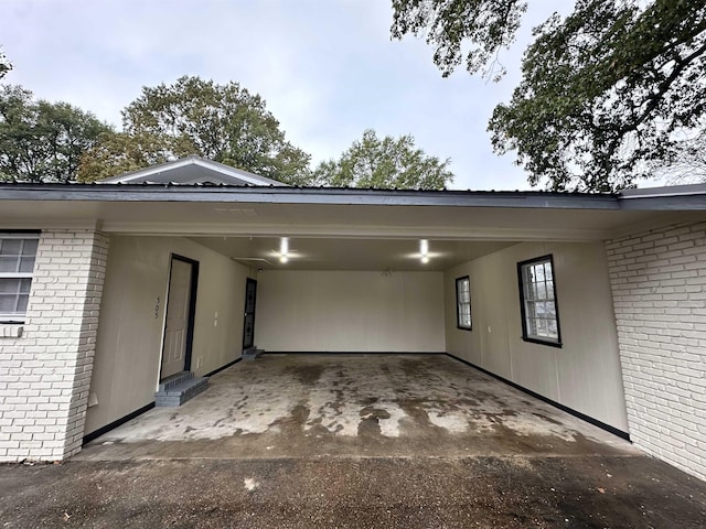 exterior space with a carport