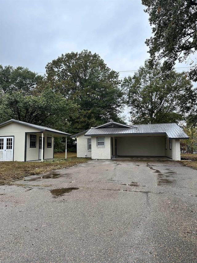 view of front of house with a carport