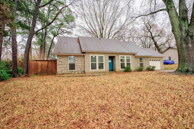 ranch-style home with a garage