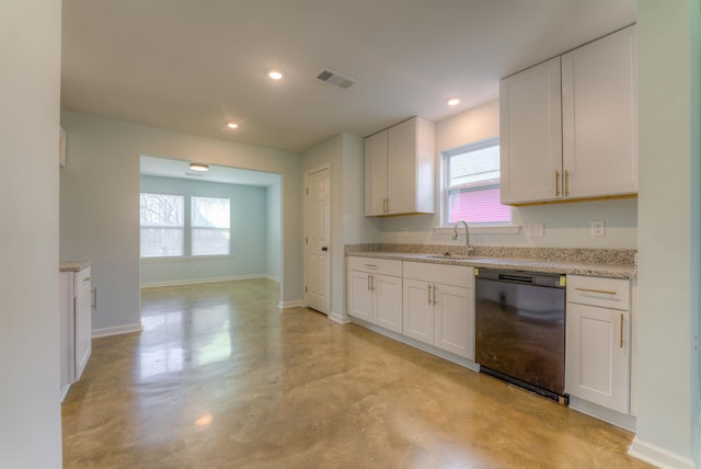 kitchen featuring dishwasher, light stone countertops, sink, and white cabinets