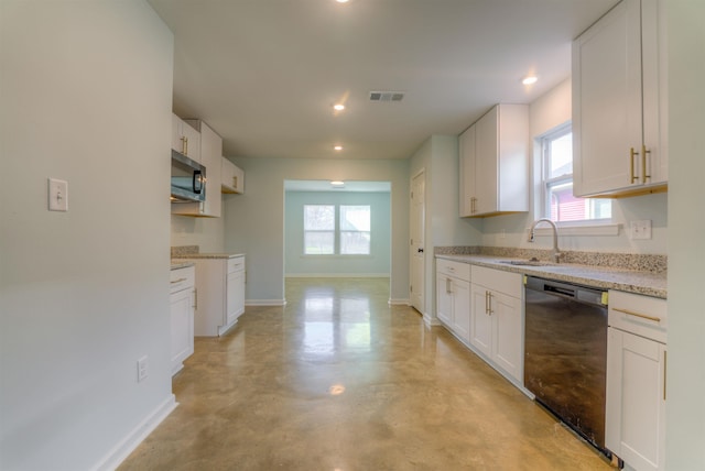 kitchen featuring white cabinetry, dishwasher, light stone countertops, and sink