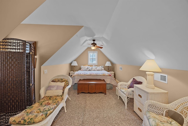 carpeted bedroom featuring lofted ceiling and ceiling fan