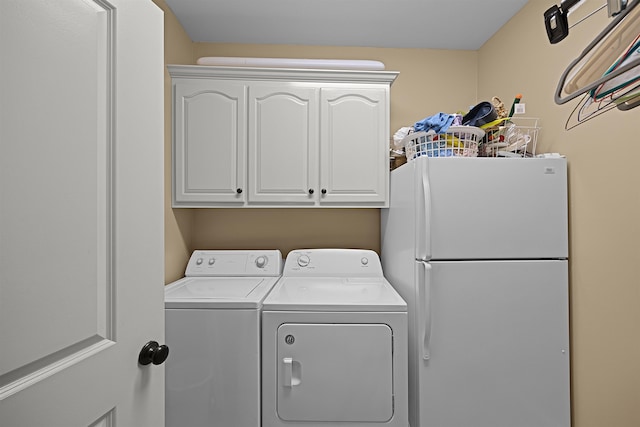 laundry room with independent washer and dryer