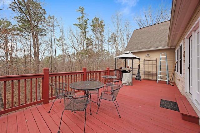 wooden deck with a gazebo