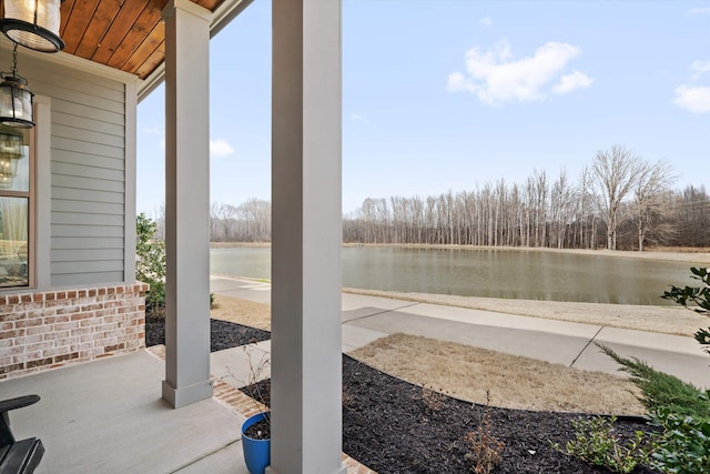 view of patio / terrace featuring a water view