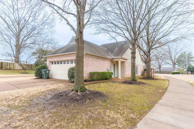 view of side of property featuring a garage