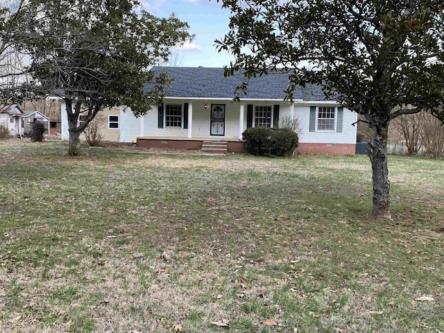 ranch-style home with covered porch and a front lawn