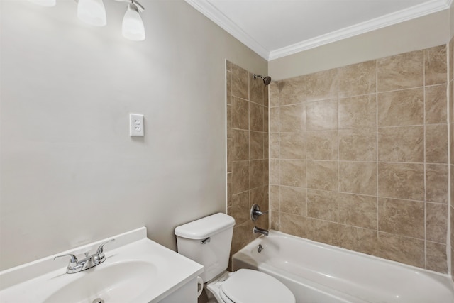 full bathroom with vanity, ornamental molding, toilet, and tiled shower / bath