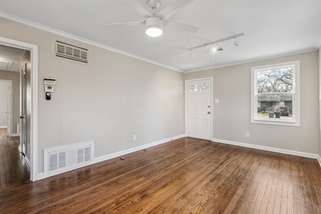 interior space featuring crown molding, rail lighting, dark hardwood / wood-style floors, and ceiling fan