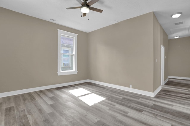 unfurnished room with light hardwood / wood-style floors and ceiling fan