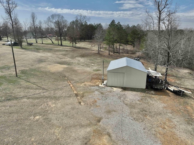 exterior space featuring an outbuilding and a rural view