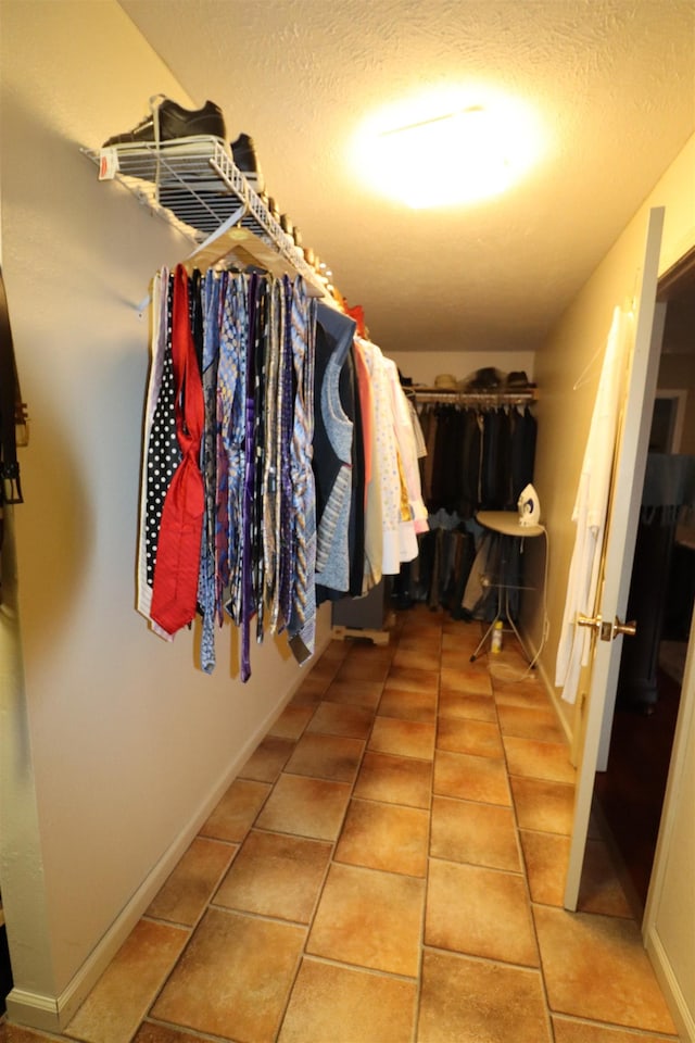 walk in closet featuring tile patterned floors