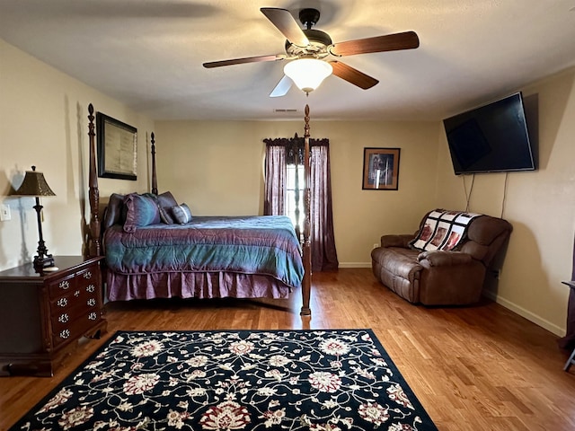 bedroom featuring ceiling fan and light wood-type flooring