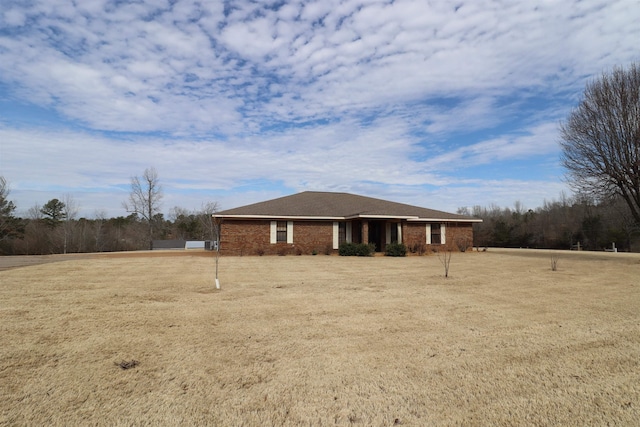 view of property exterior with a yard