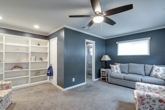 carpeted living room with crown molding and ceiling fan