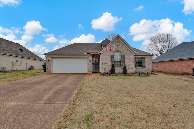 view of front facade featuring a garage, central AC unit, and a front yard