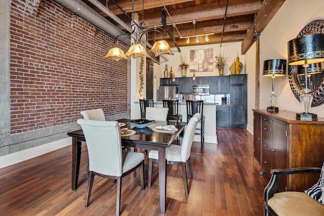 dining room featuring brick wall, dark hardwood / wood-style flooring, and a high ceiling