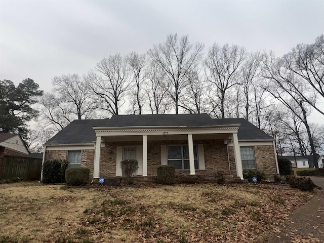 view of front of property featuring covered porch