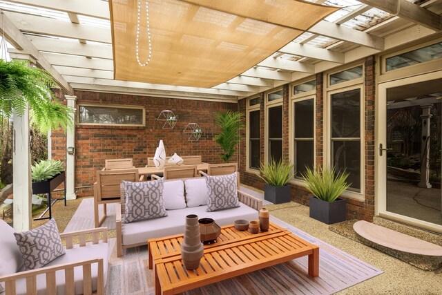 view of patio with outdoor dining space, an outdoor hangout area, and a pergola
