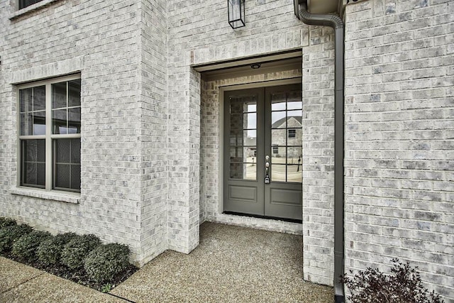 entrance to property featuring french doors