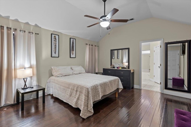 bedroom with lofted ceiling, dark hardwood / wood-style floors, and ceiling fan