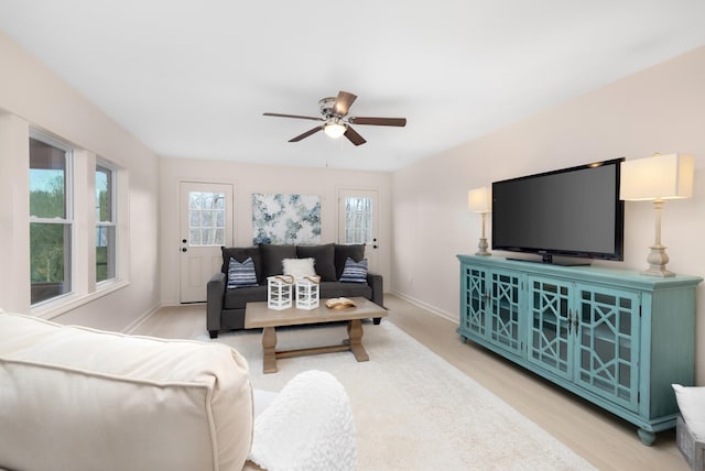 living room with ceiling fan