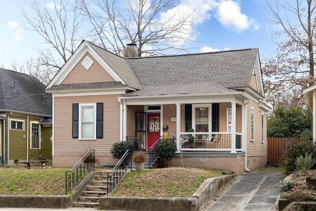 bungalow-style home with a porch